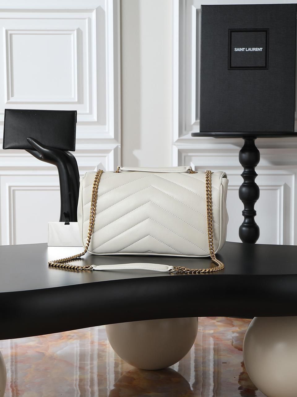 YSL “Luxe Ivory Quilted Chain Bag”