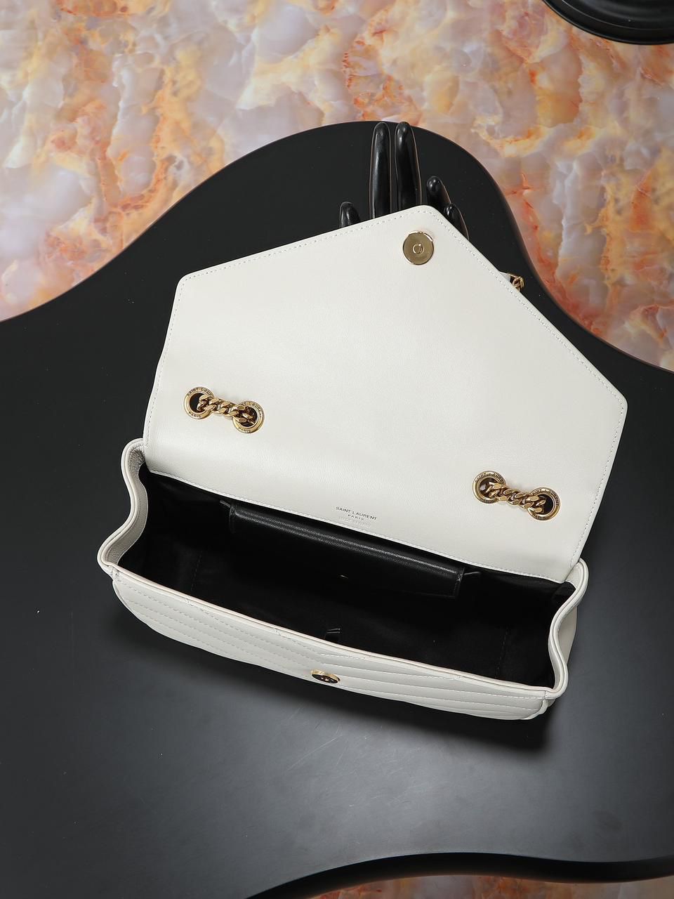 YSL “Luxe Ivory Quilted Chain Bag”