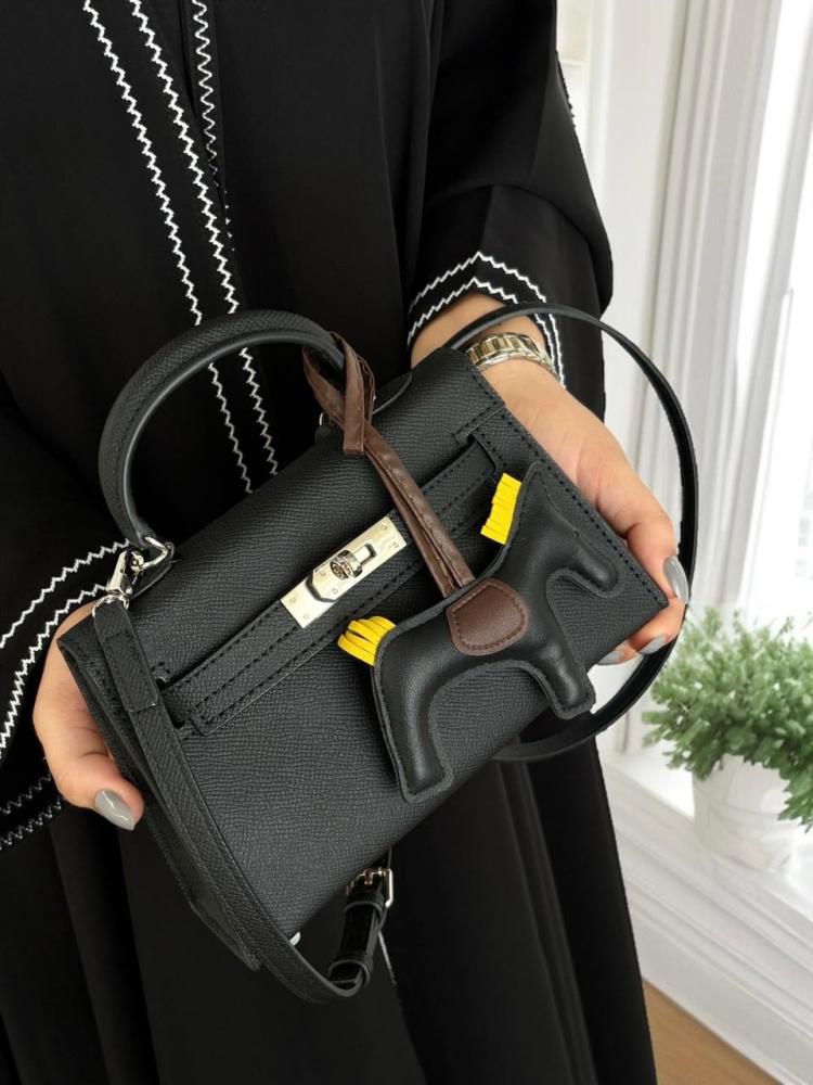 *HERMES KELLY ADORNED WITH HORSE SHAPED PREMIUM LEATHER HAND BAG